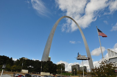 Gateway Arch and USA flag and boat
