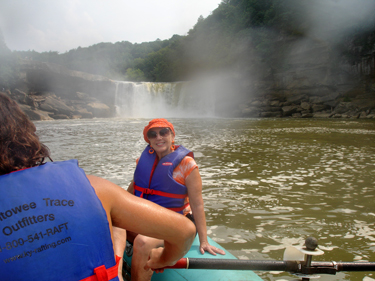 Karen Duquette in front of Cumberland Falls