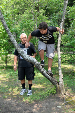 Alex climbing a tree