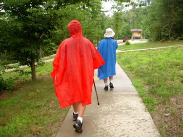Lee Duquette and Alex in rain gear