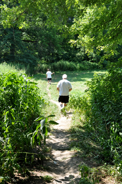Alex and Lee walking down to get below the Creek Road Covered Bridge