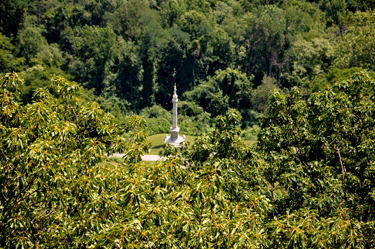 a statue far below