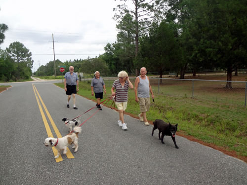 The two RV Gypsies and friends walking to the lake