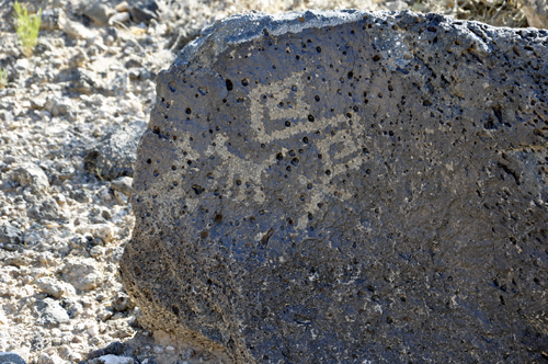 a petroglyphs on a rock atBoca Negra Canyon