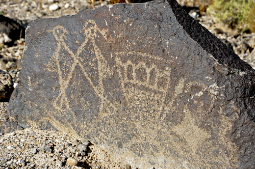 a petroglyphs on a rock atBoca Negra Canyon