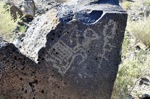 a petroglyphs on a rock atBoca Negra Canyon