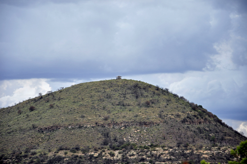 zoom in on the hill - there is a building up there.