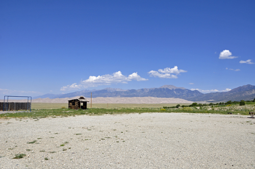 view of the sand dunes from the yard of the two RV Gypsies