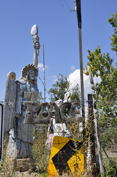 Peace wood sculpture