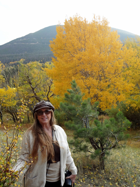 Karen Duquette and fall foliage at Rocky Mountain National Park