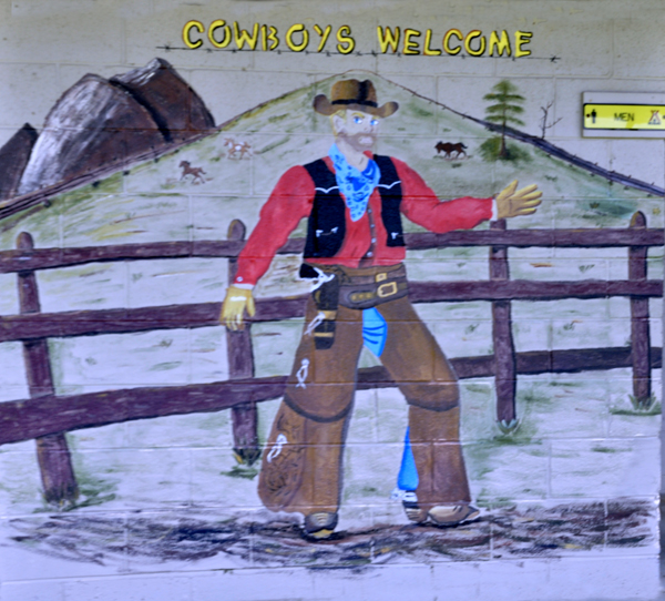 cowboy sign for the men's room at the Bristol / Kingsport KOA 
