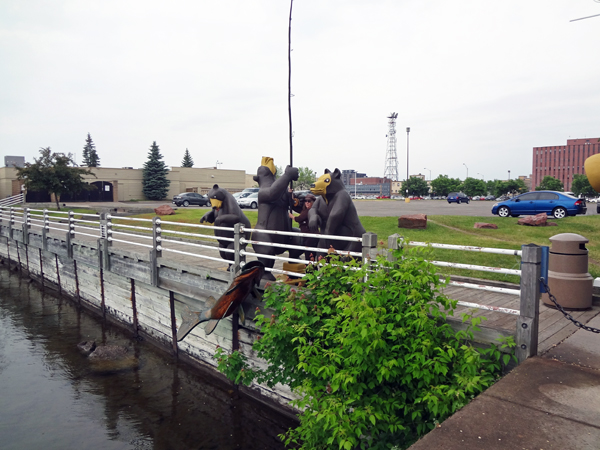 Karen Duquette helps the bears reel in the fish