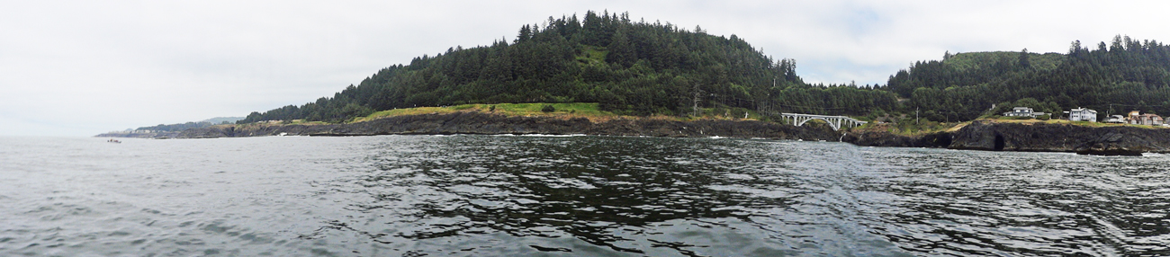 view of the shoreline as the boat enters the Pacific Ocean