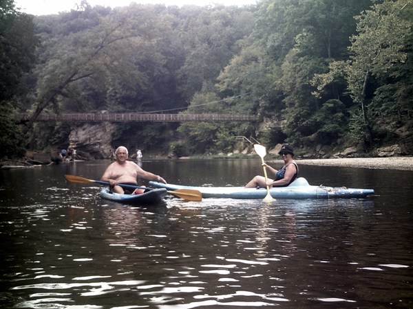 The two RV Gypsies kayaking Sugar Creek