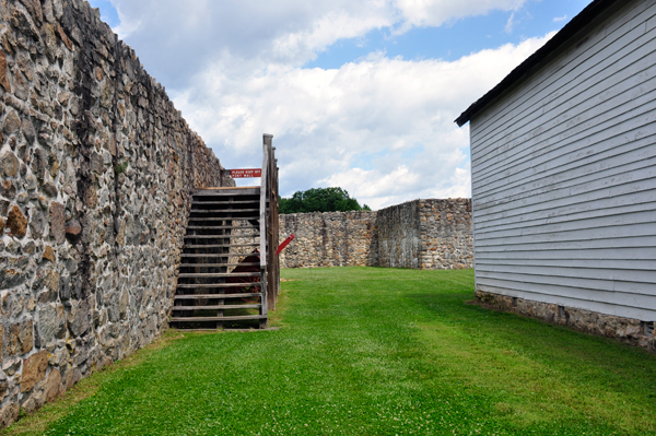 part of the wall behind the building