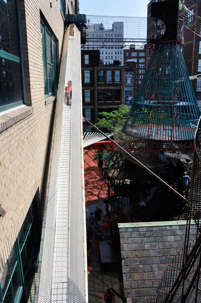 child in a narrow slide