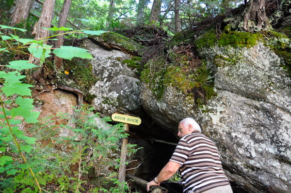 Lee ducks under the ARCH ROCK