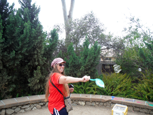 Karen playing with bubbles.