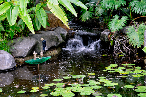figurines in the rainforest