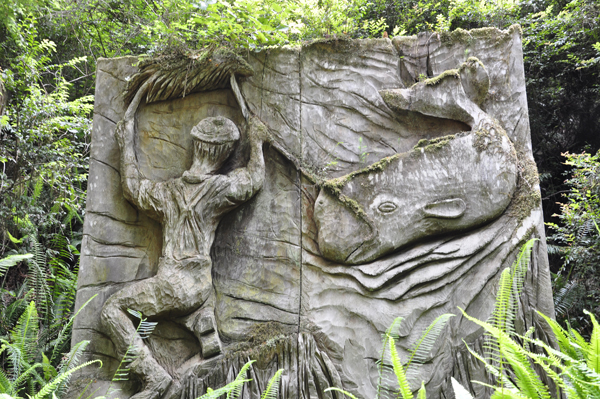 man and whale sculpture
