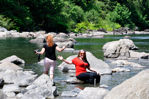 Karen and her sister carefully maneuvering over the rocks.