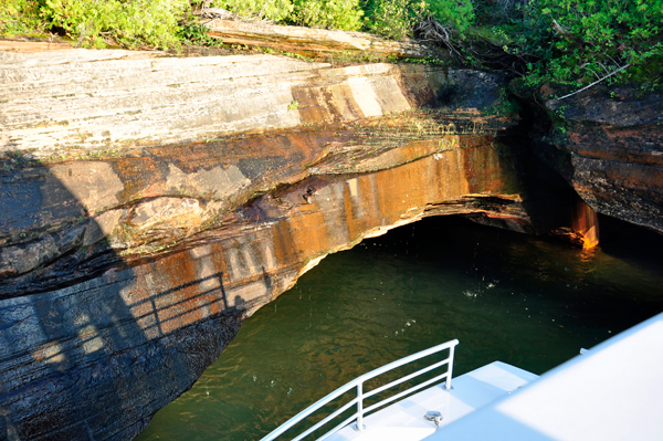 the boat goes close to the cliffs