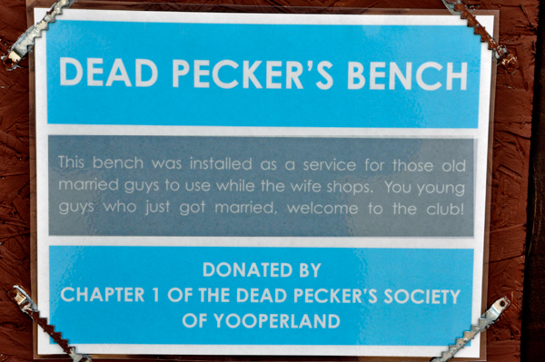 sign about the old guys resting bench
