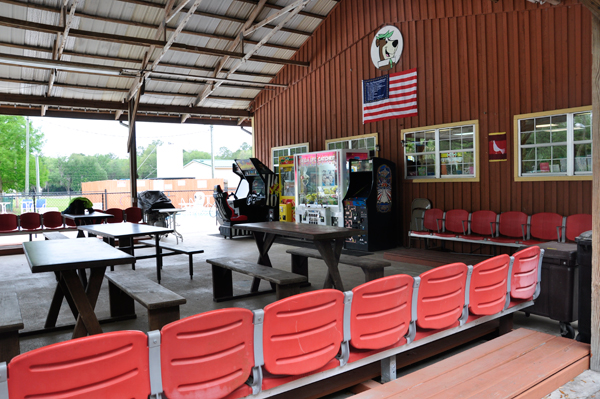 outside theater area with a few more arcade games