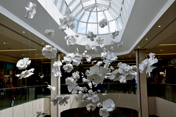 white flowers hanging from the ceiling