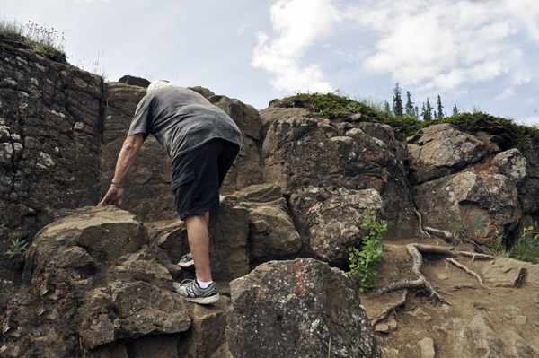 Lee Duquette climbing up the big rock