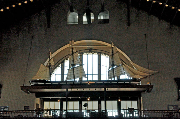 model ship over the entry doors