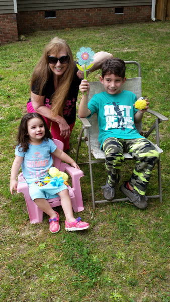 Karen Duquette and her great-grandchildren