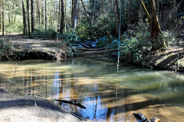 rope hanging over the water