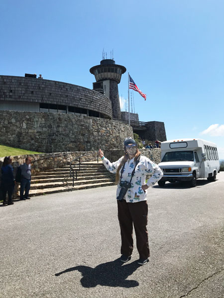 Karen Duquette points to the viewing tower