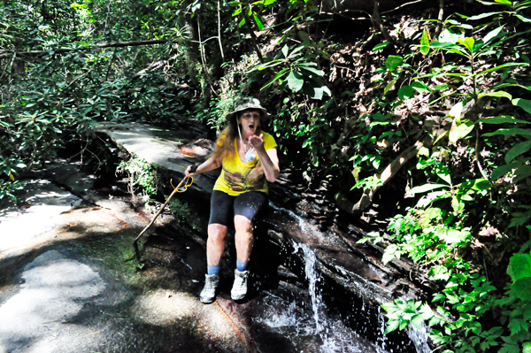 Karen Duquette by a cascade of water