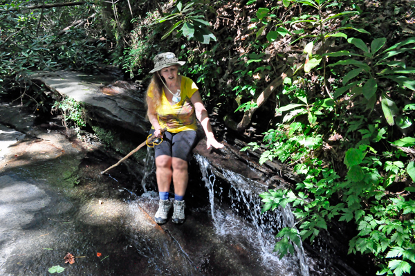 Karen Duquette by a cascade of water
