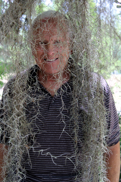 Lee Duquette covered in moss