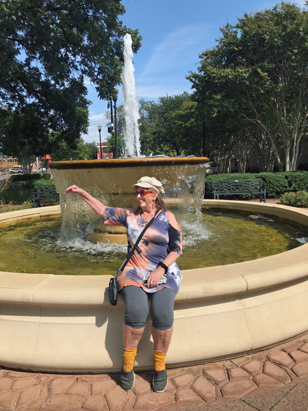 Karen Duquette and the water fountain at Everman Park