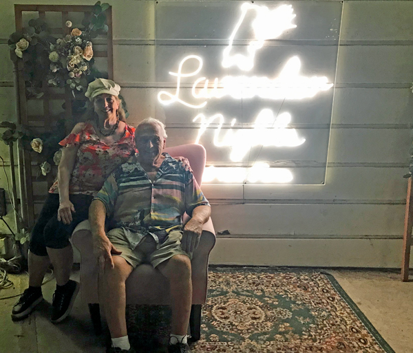 The two rV Gypsies at the Lavender Nights sign