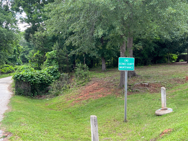 end Oconee County Maintenance sign