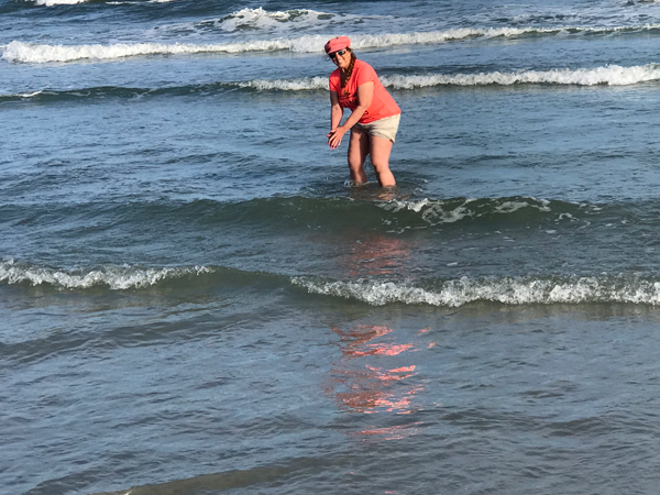 Karen Duquette playing im the oceacn at Sunset Beach
