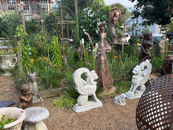 statues at Log House 1776 Restaurant Garden