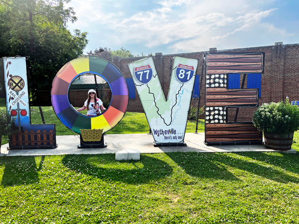 Karen Duquette at the love sign in Wytheville VA