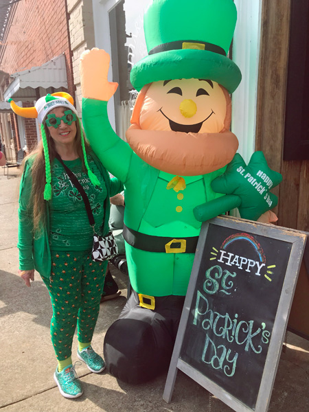 Karen Duquette and a giant Leprechaun