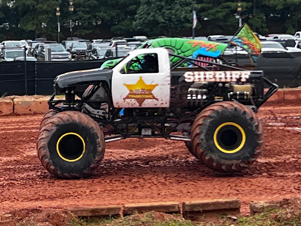 T-Rex and Sheriff Monster Trucks