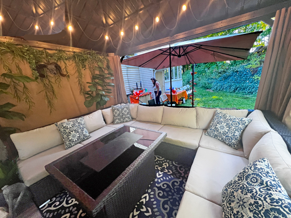 Lisa Duquette and the couch in the tent area