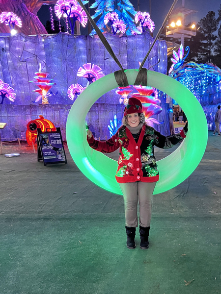 Karen Duquette on a  green swing