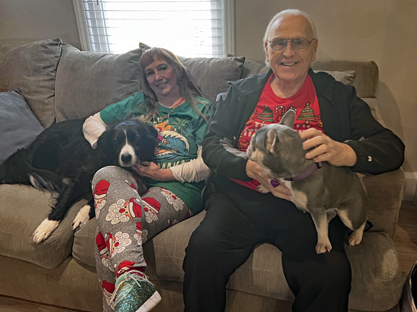 Karen and Lee Duquette with two dogs