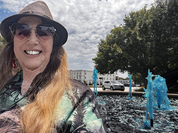 Karen Duquette at the blue fountain