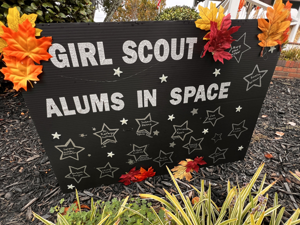 girl Scout in space sign